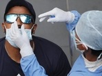 File photo: A health worker collect nasal swab for Covid-19 testing. File photo: A health worker collect nasal swab for Covid-19 testing.