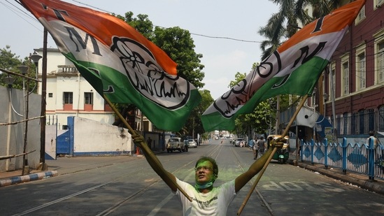 An All India Trinamool Congress (TMC) supporter celebrates the party’s victory in the West Bengal Assembly election, at Gopal Nagar in Kolkata, on May 2. TMC, led by India’s only woman chief minister Mamata Banerjee — swept the West Bengal assembly polls of 2021 for the third time. TMC’s victory comes as a sign of the continued assertion of regional parties in Indian politics and a major setback to the Bharatiya Janata Party (BJP).(Samir Jana / HT Photo)