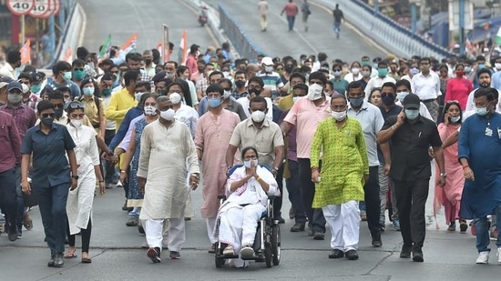 TMC chief Mamata Banerjee during a roadshow in Kolkata. (PTI Photo/Swapan Mahapatra)(HT_PRINT)