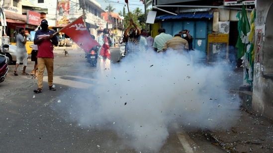 Left Democratic Front (LDF) supporters celebrating the party's winning trend in Kerala State Assembly Polls, in Thiruvananthapuram on May 2. In Kerala, breaking a four-decade-old trend, where power has alternated between the two of the state’s major political formations, the LDF led by Pinarayi Vijayan made history by comfortably returning to power for a second consecutive time.(PTI )