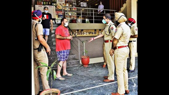 Cops inspecting the Sarabha Nagar market in Ludhiana on Monday. (Gurpreet Singh/Hindustan Times) Cops inspecting the Sarabha Nagar market in Ludhiana on Monday. (Gurpreet Singh/Hindustan Times)