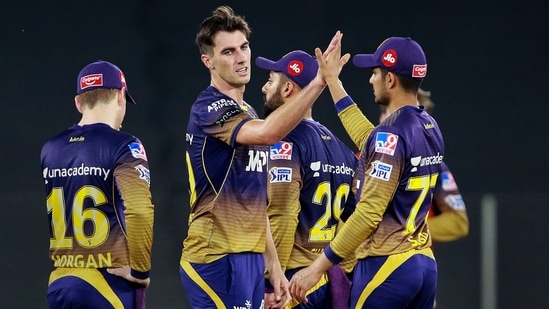 Pat Cummins with KKR teammates. (PTI)