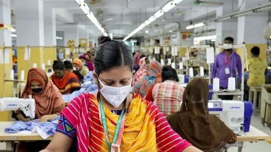 A woman works in a garment factory in Dhaka, Bangladesh (Reuters) A woman works in a garment factory in Dhaka, Bangladesh (Reuters)