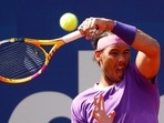 Rafael Nadal returns the ball to Stefanos Tsitsipas of Greece.(AP) Rafael Nadal returns the ball to Stefanos Tsitsipas of Greece.(AP)