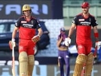AB de Villiers (L) and Glenn Maxwell (R) during RCB vs KKR IPL 2021 match in Chennai