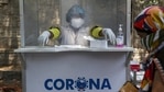 A health worker at a swab collection booth for Covid-19 tests in Hyderabad on May 3. India on May 4 registered 357,229 new Covid-19 cases in the preceding 24 hours, taking the country's total coronavirus infection tally past the 20-million mark, according to the .health ministry's data.