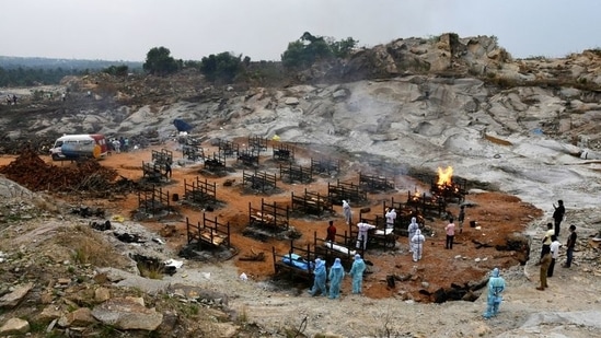 An aerial view of a crematorium ground in Giddenahalli village on the outskirts of Bengaluru on May 2. 3,449 new fatalities were recorded May 4, mounting the death toll to 222,408.(Samuel Rajkumar / REUTERS)
