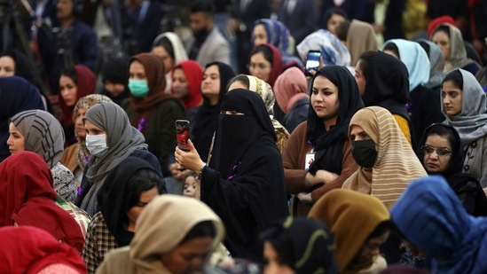 Afghan women attend an event to mark International Women's Day in Kabul, Afghanistan. (AP) Afghan women attend an event to mark International Women's Day in Kabul, Afghanistan. (AP)