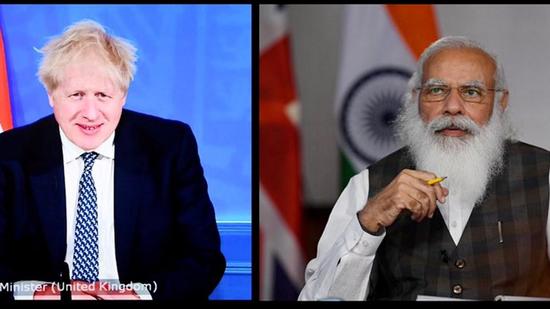 **EDS: IMAGE POSTED BY @MEAIndia** New Delhi: Prime Minister Narendra Modi and his UK counterpart Boris Johnson dueing their virtual summit, Tuesday, May 4, 2021. (PTI Photo) (PTI05_04_2021_000195B) (PTI) **EDS: IMAGE POSTED BY @MEAIndia** New Delhi: Prime Minister Narendra Modi and his UK counterpart Boris Johnson dueing their virtual summit, Tuesday, May 4, 2021. (PTI Photo) (PTI05_04_2021_000195B) (PTI)