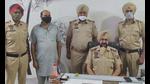 The accused trader in the custody of Sudhar police in Ludhiana on Wednesday. (HT Photo) The accused trader in the custody of Sudhar police in Ludhiana on Wednesday. (HT Photo)