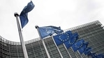 European Union flags fly outside the headquarters of the European Commission in Brussels. European Union flags fly outside the headquarters of the European Commission in Brussels.
