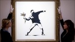 Sotheby's to accept bitcoin, ethereum for Banksy's 'Love is in the Air' artwork(Twitter/SPORTSCIRCUSINT) Sotheby's to accept bitcoin, ethereum for Banksy's 'Love is in the Air' artwork(Twitter/SPORTSCIRCUSINT)