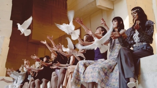 Models during the finale of the CHANEL Cruise 2021/22 show by Virginie Viard at the Carrières de Lumières, a white limestone quarry in the village of Les Baux-de-Provence, in the south of France. (Instagram) Models during the finale of the CHANEL Cruise 2021/22 show by Virginie Viard at the Carrières de Lumières, a white limestone quarry in the village of Les Baux-de-Provence, in the south of France. (Instagram)