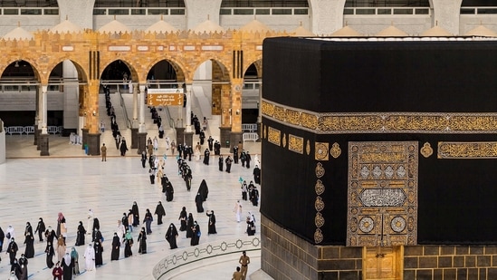 Pilgrims wearing face masks and keeping social distance perform Tawaf around Kaaba during the annual Haj pilgrimage amid the coronavirus disease in the holy city of Mecca, Saudi Arabia in this file picture from 2020. (REUTERS) Pilgrims wearing face masks and keeping social distance perform Tawaf around Kaaba during the annual Haj pilgrimage amid the coronavirus disease in the holy city of Mecca, Saudi Arabia in this file picture from 2020. (REUTERS)