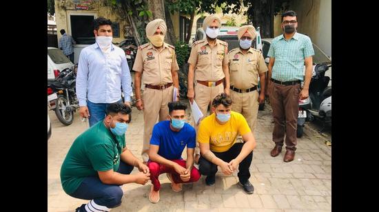 The members of the Lehmbar gang in police custody in Ludhiana on Wednesday. (HT Photo)