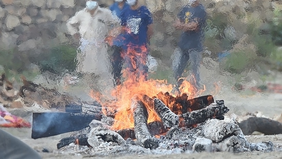 While Damodardas was being cremated, the youngest of his three daughters, Chandra, suddenly leaped into the flaming pyre, the police said, adding that the people present at the site immediately rushed in to pull her out of the fire. (File Photo) While Damodardas was being cremated, the youngest of his three daughters, Chandra, suddenly leaped into the flaming pyre, the police said, adding that the people present at the site immediately rushed in to pull her out of the fire. (File Photo)
