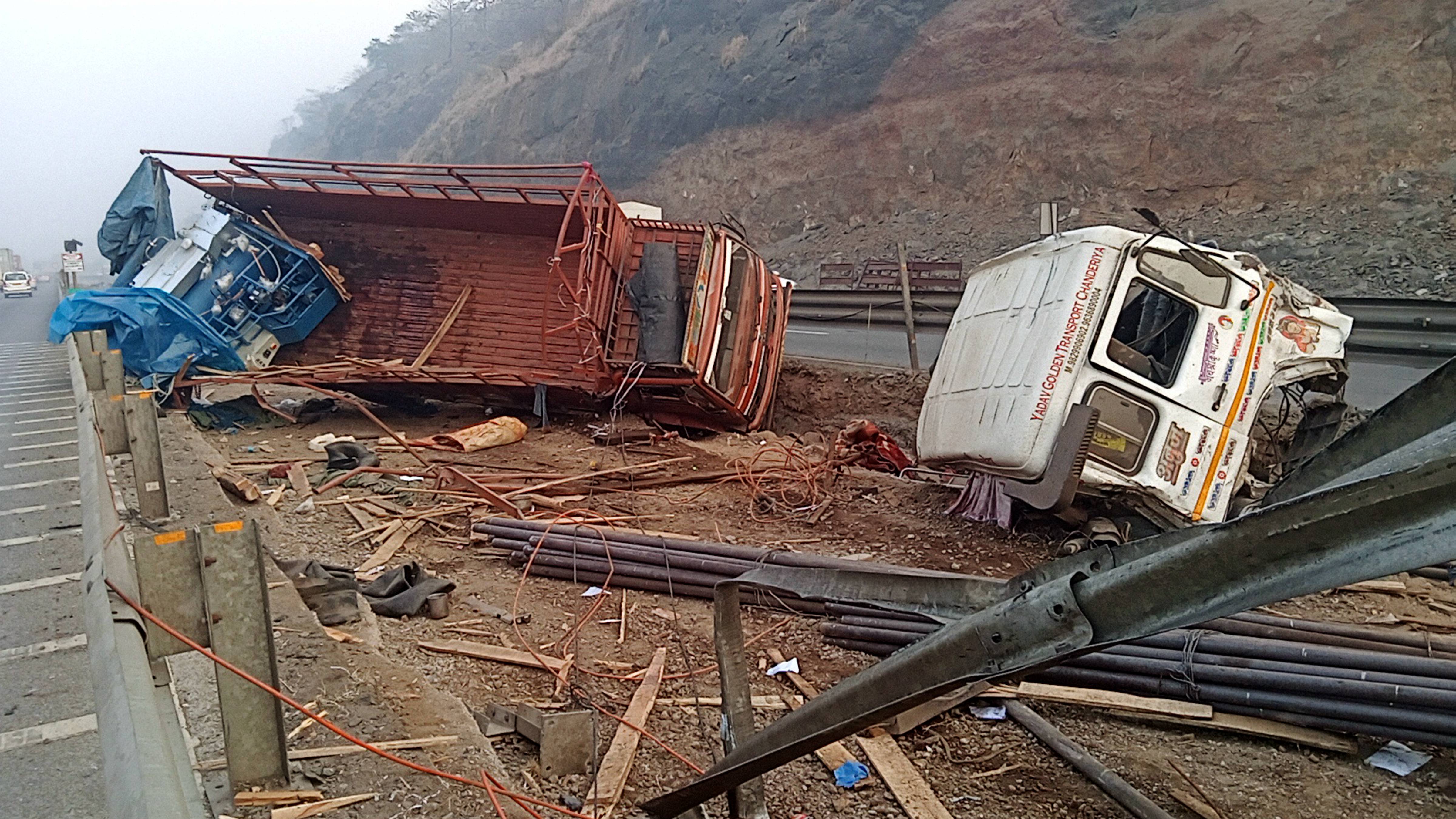 Mangled remains of vehicles lie along a road after an accident on Pune-Mumbai expressway, in Navi Mumbai, on February 16, 2021. A speeding truck rammed into a goods vehicle and two SUVs following a brake failure, thereafter, it crashed into another vehicle killing six people and five others with severe injuries near Khopoli town on the expressway. (PTI) Mangled remains of vehicles lie along a road after an accident on Pune-Mumbai expressway, in Navi Mumbai, on February 16, 2021. A speeding truck rammed into a goods vehicle and two SUVs following a brake failure, thereafter, it crashed into another vehicle killing six people and five others with severe injuries near Khopoli town on the expressway. (PTI)