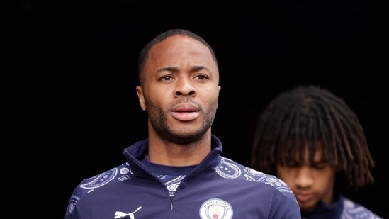 Manchester City's Raheem Sterling walks out to warm up before the match. (Pool via REUTERS)