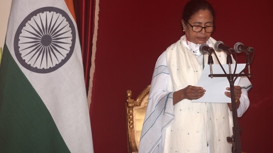 All India Trinamool Congress (TMC) chief Mamata Banerjee takes oath as chief minister of West Bengal during the swearing-in ceremony at Raj Bhavan in Kolkata.(HT Photo ) All India Trinamool Congress (TMC) chief Mamata Banerjee takes oath as chief minister of West Bengal during the swearing-in ceremony at Raj Bhavan in Kolkata.(HT Photo )