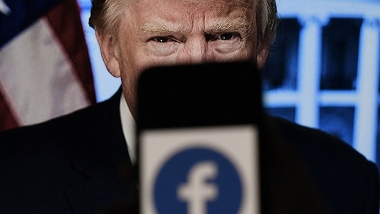 Trump called the decision and his banning across tech platforms "a total disgrace" and said the companies would "pay a political price." (AFP) Trump called the decision and his banning across tech platforms "a total disgrace" and said the companies would "pay a political price." (AFP)