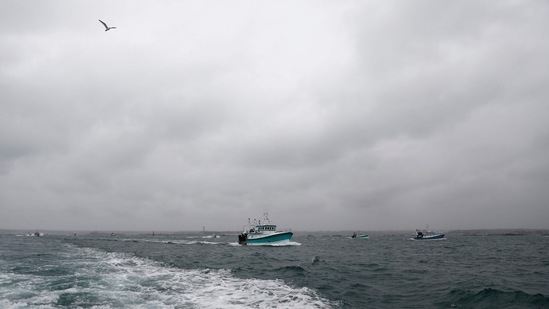 French fishing boats return home following their protest in front of the port of Saint Helier off the British island of Jersey. (AFP) French fishing boats return home following their protest in front of the port of Saint Helier off the British island of Jersey. (AFP)