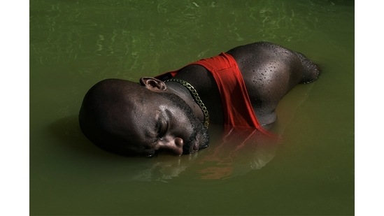 RECONCILIATION: “After being apart for six months during the pandemic, my partner Pholo Kimbuende and I were summer road-tripping through Virginia and stopped to cool off at a local swimming spot in the James River, where I took this picture,” says Kate Warren (@gokateshoot), 32, from the US. “Titled Whisper My Sins to Me, it explores racial trauma, representation and reconciliation within my interracial relationship, in the context of the Black Lives Matter movement.”(Kate Warren)