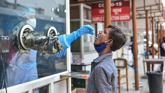 The number of active cases in Lucknow has risen from 3,912 on April 1 to 29,827 on May 5. In picture - Health worker conducts Covid-19 testing at Ram Manohar Lohiya Hospital, in Lucknow.(PTI)