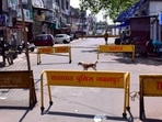 Police barricades placed on a road in Jabalpur during a curfew imposed to curb the spread of coronavirus disease (Covid-19), in Madhya Pradesh on May 4. Kerala, Madhya Pradesh and Rajasthan imposed complete lockdowns on May 6, joining several other states that have curbed movement of people and banned gatherings to arrest the second wave of coronavirus infections.(ANI)