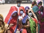 Women show voter id cards during Panchayat election, at Bakkas polling centre, in Lucknow, Uttar Pradesh. (Deepak Gupta / Hindustan Times) Women show voter id cards during Panchayat election, at Bakkas polling centre, in Lucknow, Uttar Pradesh. (Deepak Gupta / Hindustan Times)