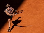 Germany's Alexander Zverev returns the ball to Spain's Rafael Nadal during their match at the Mutua Madrid Open.