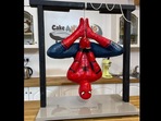 The image shows the inverted Spider-man cake by Lara Mason. The image shows the inverted Spider-man cake by Lara Mason.