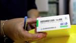 A healthcare worker handles China's Sinopharm coronavirus disease vaccines at a sport centre, as the country continues its mass inoculation campaign, in Stip, North Macedonia. (REUTERS) A healthcare worker handles China's Sinopharm coronavirus disease vaccines at a sport centre, as the country continues its mass inoculation campaign, in Stip, North Macedonia. (REUTERS)