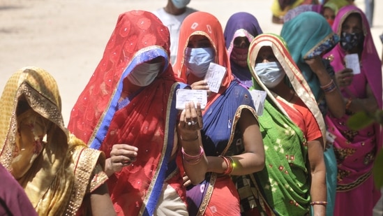Women show voter id cards during Panchayat election, at Bakkas polling centre, in Lucknow, Uttar Pradesh. (Deepak Gupta / Hindustan Times) Women show voter id cards during Panchayat election, at Bakkas polling centre, in Lucknow, Uttar Pradesh. (Deepak Gupta / Hindustan Times)