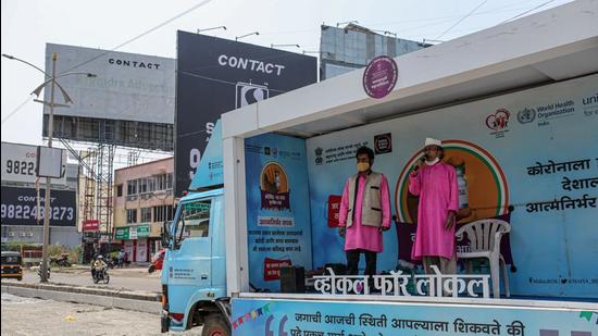 People raise awareness for the Covid-19 vaccination program in Pune, Maharashtra, on May 6, 2021. (BLOOMBERG) People raise awareness for the Covid-19 vaccination program in Pune, Maharashtra, on May 6, 2021. (BLOOMBERG)