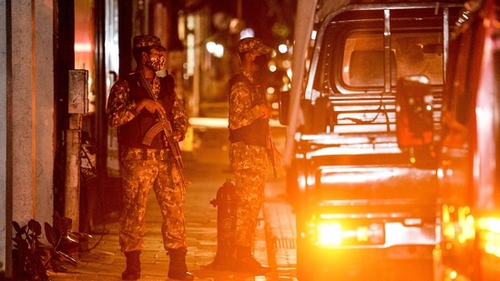 Soldiers secure a site after a bomb blast injured former Maldives president and current parliament speaker Mohamed Nasheed in Male. (AFP) Soldiers secure a site after a bomb blast injured former Maldives president and current parliament speaker Mohamed Nasheed in Male. (AFP)