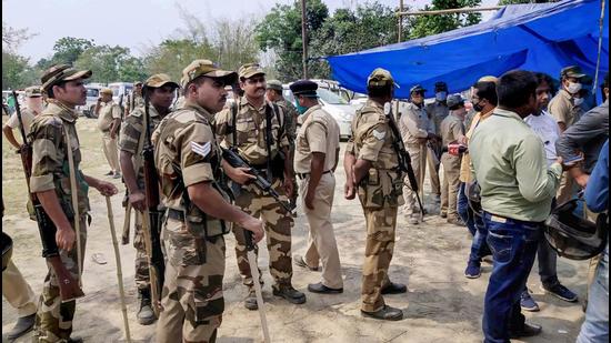 Security personnel at a polling station after EC stopped voting exercise at a polling station in Sitalkuchi, where clashes erupted between locals and central forces, at Sitalkuchi in Cooch Behar district of West Bengal on April 10. (File photo)