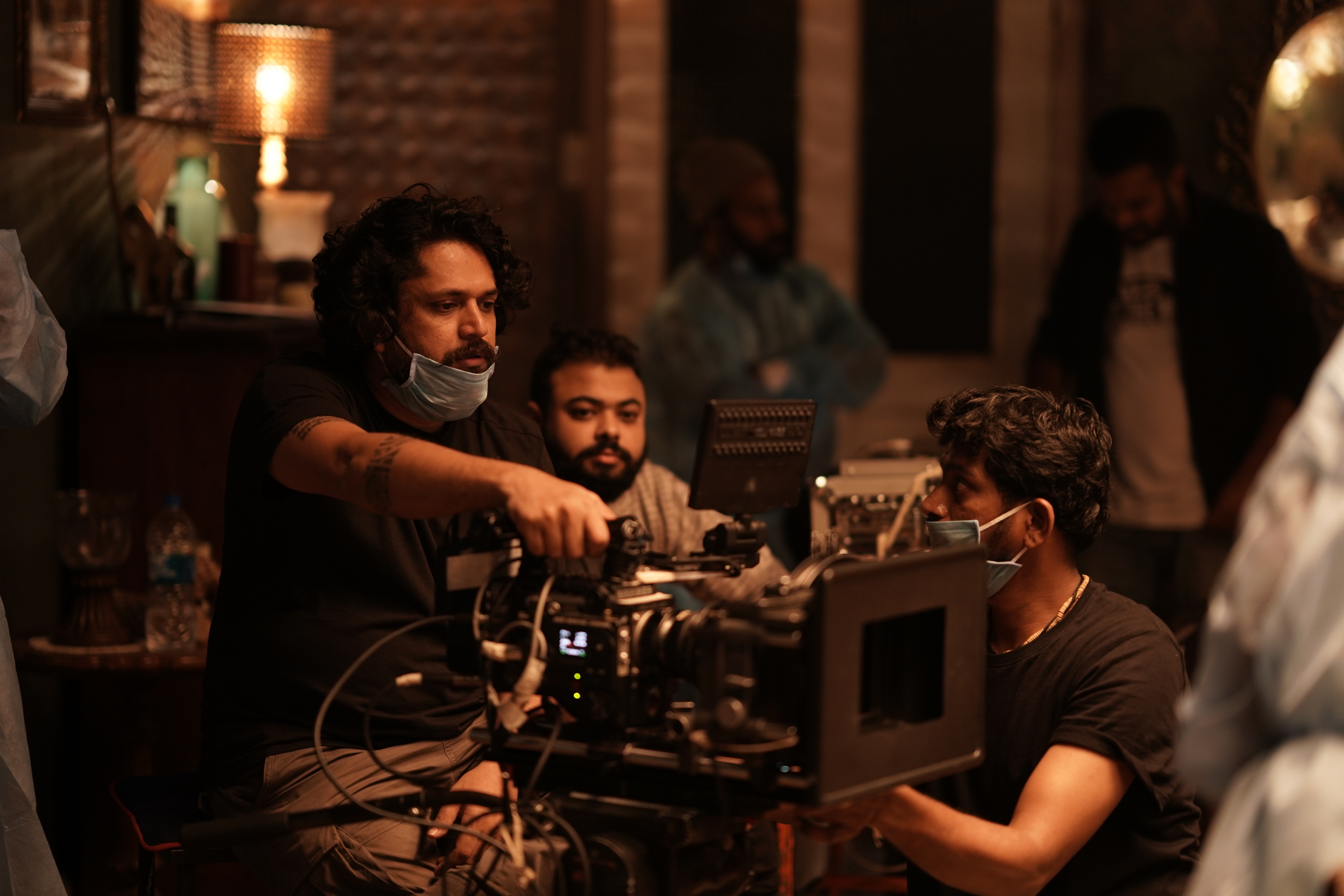 John (extreme left) at work on the film. John (extreme left) at work on the film.