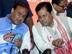 Assam BJP leader Himanta Biswa Sarma interacts with Sarbananda Sonowal during the recently concluded Assam assembly polls. (ANI file PHOTO.)