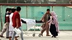 An injured school student is transported to a hospital after a bomb explosion near a school west of Kabul, Afghanistan.(AP) An injured school student is transported to a hospital after a bomb explosion near a school west of Kabul, Afghanistan.(AP)