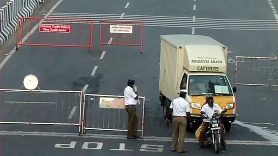 Police check vehicles during the weekend lockdown in the state to curb the spread of coronavirus cases, in Chennai. (ANI Photo)