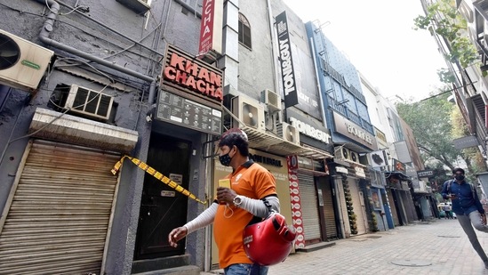 Delhi Police sealed Khan Chacha restaurant after oxygen concentrators and other medical supplies being black marketted were seized from here in Khan Market, in New Delhi, (Sanjeev Verma/HT PHOTO)