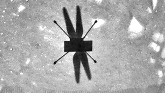 Shadow of Ingenuity on the Martian surface. (AP)