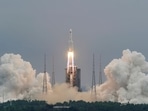 FILE PHOTO: The Long March-5B Y2 rocket, carrying the core module of China's space station Tianhe, takes off from Wenchang Space Launch Center in Hainan province, China April 29, 2021. China Daily via REUTERS