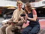 This image released by IFC Films shows Andrew Garfield, left, and Maya Hawke in a scene from Mainstream, a film by Gia Coppola. (Beth Dubber/IFC Films via AP)(AP)