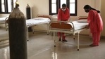 “As regards the availability of oxygen, the present demand of the state is 280 MT per day as against the availability of about 150 MT," Ashwani Kumar said in his letter. In picture - Health workers arrange beds for Covid-19 patients.(AFP) “As regards the availability of oxygen, the present demand of the state is 280 MT per day as against the availability of about 150 MT," Ashwani Kumar said in his letter. In picture - Health workers arrange beds for Covid-19 patients.(AFP)