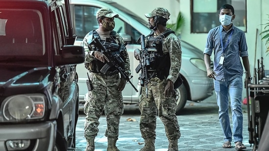 Maldives National Defence Force (MNDF) personnel stand guard in the capital Male following the May 6 attempted assassination of Maldives' former president Mohamed Nasheed who is recovering in hospital. (AFP) Maldives National Defence Force (MNDF) personnel stand guard in the capital Male following the May 6 attempted assassination of Maldives' former president Mohamed Nasheed who is recovering in hospital. (AFP)