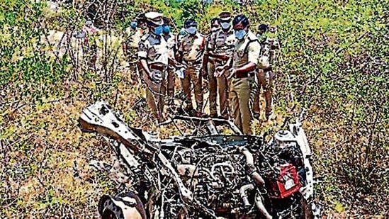 Police personnel inspect the blast site at a limestone quarry in Kadapa district on Saturday. (PTI) Police personnel inspect the blast site at a limestone quarry in Kadapa district on Saturday. (PTI)