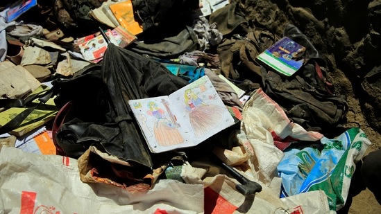 Books, notebooks and other school supplies are left behind after deadly bombings on Saturday near a school in Kabul, Afghanistan. (AP) Books, notebooks and other school supplies are left behind after deadly bombings on Saturday near a school in Kabul, Afghanistan. (AP)