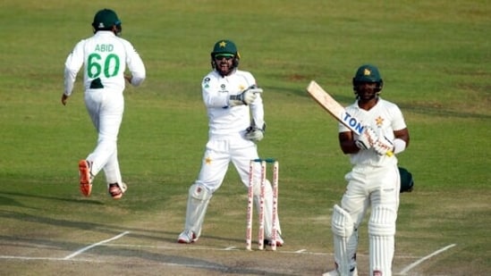 Pakistan wicketkeeper Mohammad Rizwan, centre, celebrates the wicket of Zimbabwe batsman Regis Chakabva(AP)