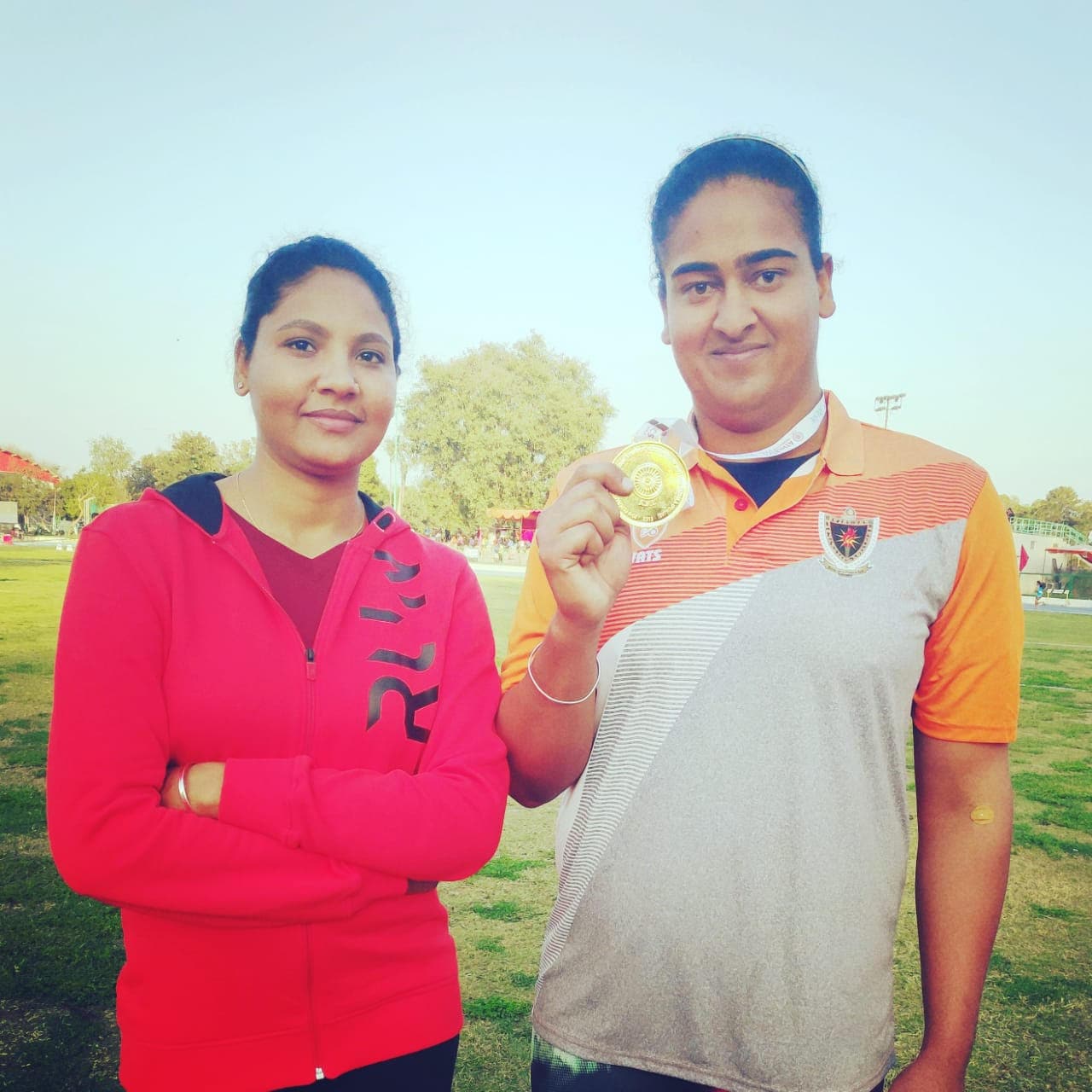 Kamalpreet Kaur with her coach Rakhi Tyagi(HT Photo)